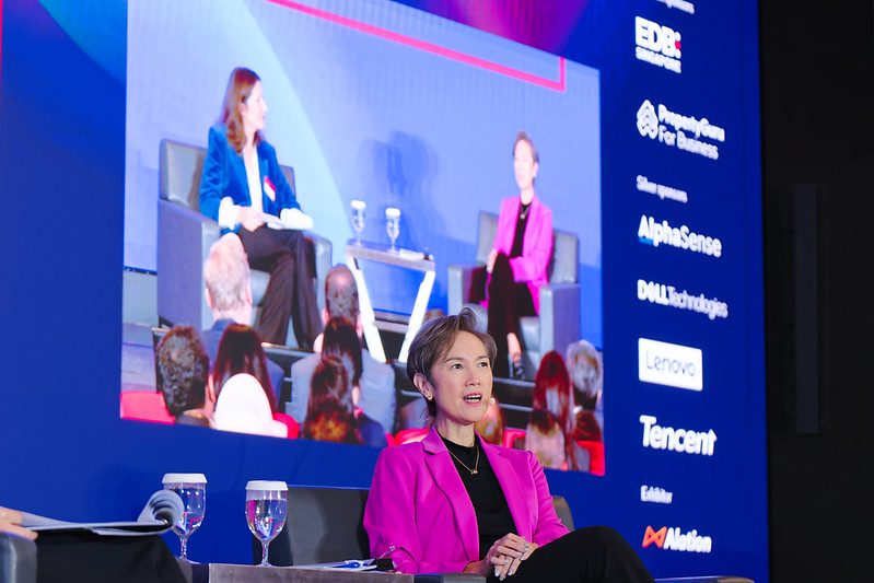 Panel discussion with five speakers on stage at AI Innovation Asia 2024