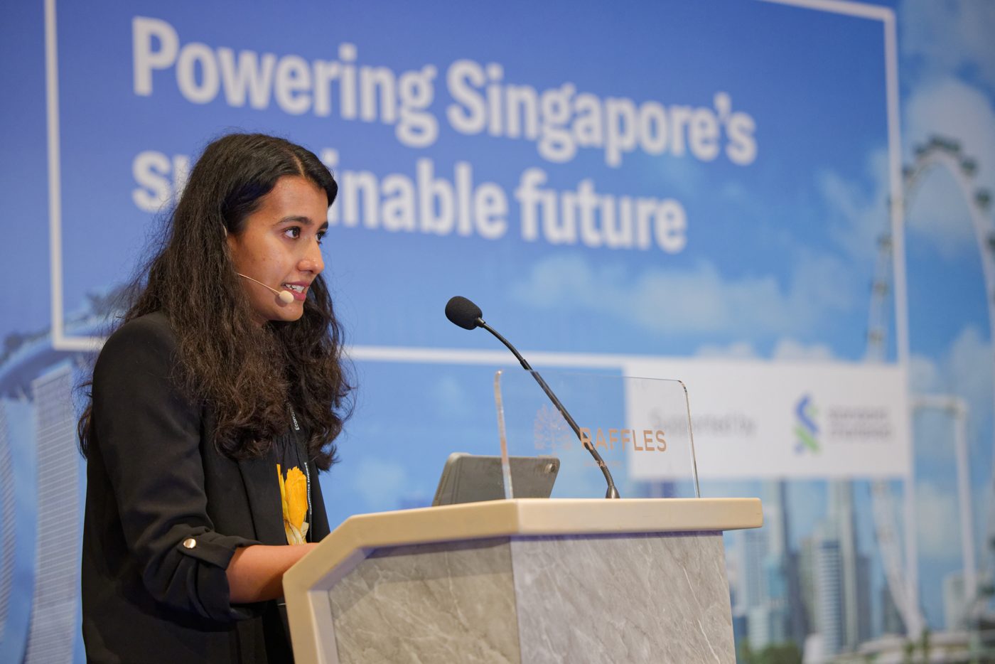 Speaker at the podium for the Standard Chartered Salon